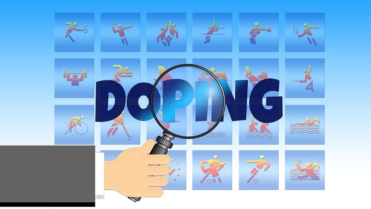 palavra doping em destaque com uma luta. ao fundo, símbolos de vários esportes
